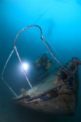Diver with wreck,Capernwray 10.5mm. by Derek Haslam 